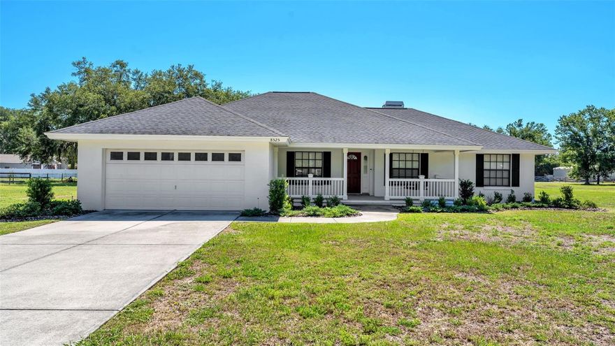 Welcome to your own slice of country paradise in North Lakeland! Situated on 1.29 acres, this beautifully maintained home offers the perfect blend of peaceful farmhouse charm and everyday convenience. From the inviting front porch with swing seating to the wide-open property surrounded by mature trees, this home delivers that sought-after country living feel while still being just minutes from shopping, restaurants, and major highways for an easy commute.
Inside, you’ll find a spacious split-bedroom layout with soaring ceilings, oversized living areas, and a stunning brick fireplace that creates a warm and welcoming focal point. The kitchen offers abundant cabinetry, generous counter space, and an open flow perfect for entertaining or everyday living. The primary suite features dual vanities, a large walk-in shower, and a private retreat feel, while the additional bedrooms and bathrooms provide plenty of space for family or guests.
Step outside and enjoy the oversized covered back patio overlooking the expansive acreage — ideal for relaxing mornings, entertaining friends, or simply enjoying the quiet country setting. With plenty of room for toys, animals, gardening, or future additions, this property offers flexibility that’s hard to find.
Best of all, this home qualifies for USDA financing, meaning eligible buyers may purchase with ZERO DOWN PAYMENT! If you’ve been searching for space, privacy, charm, and convenience all in one package, this North Lakeland gem is a must-see.