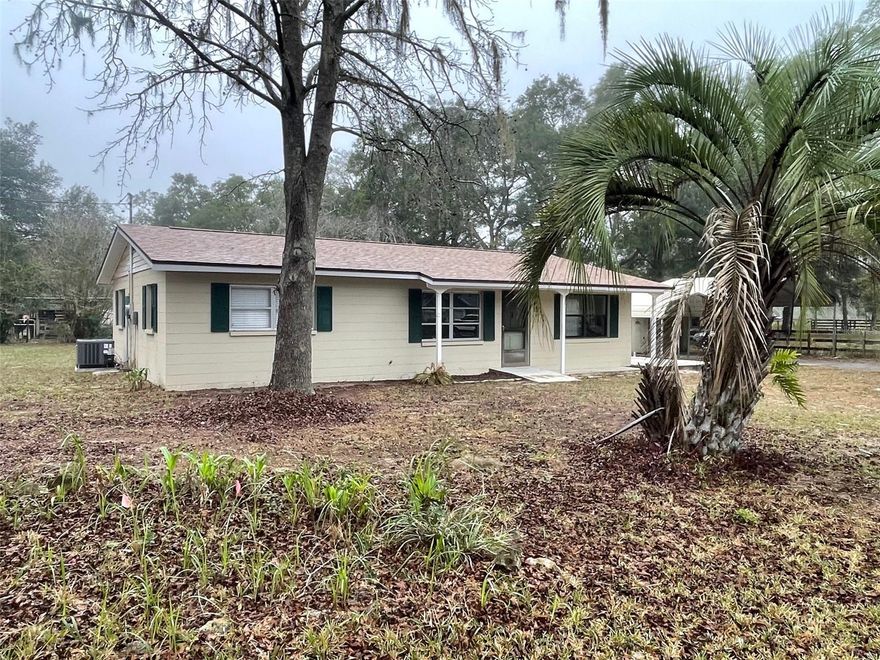 Beautifully updated 3-bedroom, 1-bath concrete block home offering space, comfort, and a convenient Ocala location. This home features approximately 1,469 sq ft of living space and sits on a paved road with a spacious double lot (approx. 0.48 acres) shaded by mature trees.
Recent upgrades include a brand-new shingle roof (Dec 2025), HVAC replaced in 2024, new electrical panels, newer water heater, brand-new kitchen appliances, luxury vinyl plank flooring throughout, and fresh interior paint. The property is fully fenced with new four-board perimeter fencing.
Additional features include two covered carports and a 16’ x 24’ workshop (some exterior wood repair needed), providing excellent storage and workspace options.
Located just 7 miles from the World Equestrian Center and 5 miles from Rainbow River head springs, with easy access to Ocala, Dunnellon, WEC, HITS, and Rainbow Springs recreation. Quiet setting while remaining close to shopping, dining, and outdoor activities.