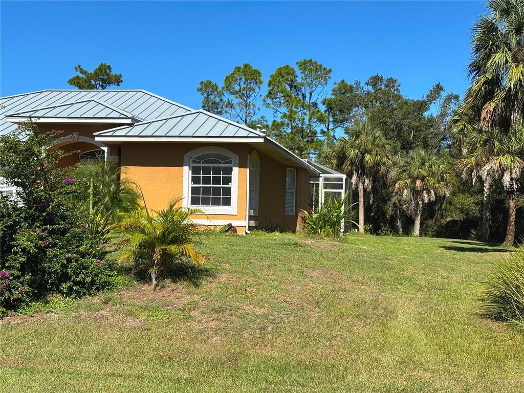 Photo of 5540 Allamanda Avenue, North Port, FL 34288 (MLS # C7516928)