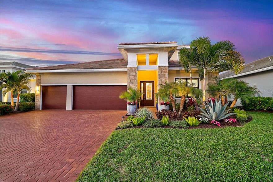 Need Space & Quiet? This beautifully designed home delivers Both! 4 Bedrooms, 4 Bathrooms & Den + a Smart Split Bedroom Floor Plan...Located in a Gated 55+ Community with resort-style amenities & Full-Time LifeStyle Director. An Entertainer’s Kitchen anchors the main living space with Quartz Countertops, Stacked White Cabinetry, Upgraded Appliances (Convection Oven)+ Custom Pantry. The Owner’s Suite is spacious & private, featuring Split Vanities, a large Zero-Entry Shower & Closet System. 1 Guest Ensuite + Shower is tucked away for added Privacy. Upstairs, you'll find a Large Bonus Room = No Rules Zone—Ideal for crafts, movies, hobbies, or shutting the door and doing your own thing—plus a Private Bedroom & Adjacent Full Bath.  The Outside Steals the Show! A Custom Pool + Spillover Spa Invites to Unwind++ Private Lanai that feels more like a boutique resort than a backyard. The Outdoor Kitchen, Lush Landscaping & Professionally Designed Lighting turn evenings into an Experience. Quiet. Relaxed. Completely Private. It’s the kind of space where time slows down & plans get canceled because you’d rather stay home.  3 Car-Attached Garage=Space for the Florida Lifestyle.  There's so much more to see!