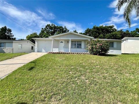 Photo of 5033 Farley Drive, Holiday, FL 34690 (MLS # TB8546188)