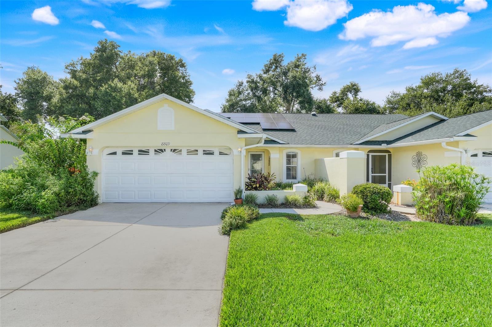This peaceful 2-bedroom, 2-bath villa sits on a rare ¼-acre lot in a quiet, low-traffic area and offers both comfort and efficiency. Featuring a 2-CAR GARAGE, SOLAR PANELS (PAID OFF AT CLOSING) for long-term energy savings, a WATER SOFTENER, and recent upgrades including a new HVAC (2021) and ROOF (2019), this home is move-in ready. Residents can enjoy access to a clubhouse and community pool, making it the perfect blend of relaxation and convenience. Call today to schedule your private showing!