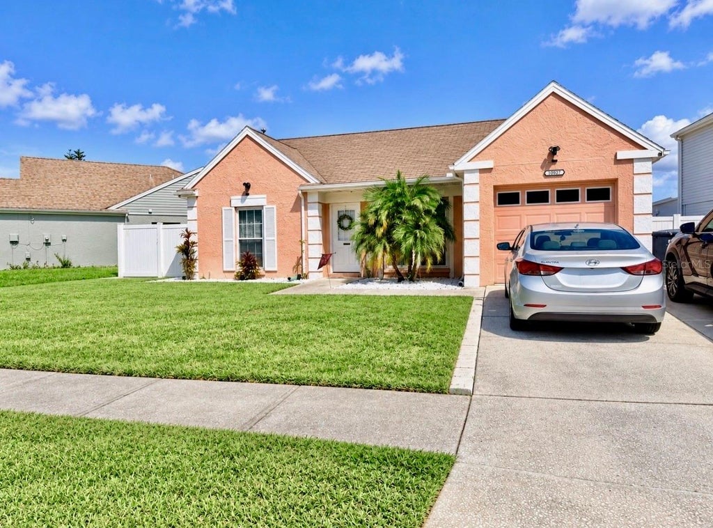 Photo of 10957 Brightside Drive, Tampa, FL 33624 (MLS # TB8559733)
