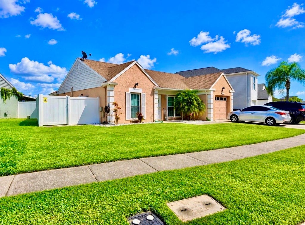 Photo of 10957 Brightside Drive, Tampa, FL 33624 (MLS # TB8559733)
