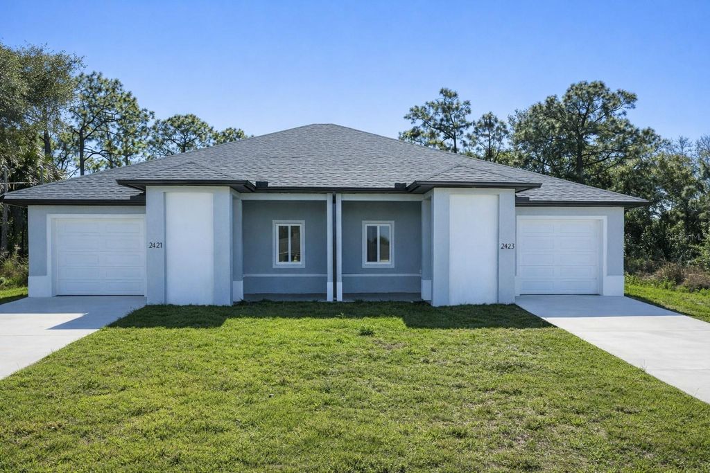 Photo of 2423 Milton Avenue S, Lehigh Acres, FL 33973 (MLS # C7523938)