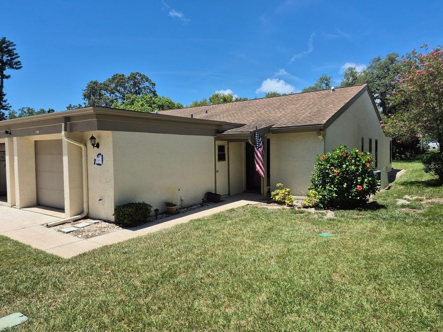 PRICED TO SELL!!!         - 
Just south of Tarpon Springs, right in the center of everything there is to do on the Central West Coast of Florida sits Green Dolphin Park Villas, a quiet, friendly, 55 plus community, right next to a golf course! Live where you can count on everything outside the door of your condominium villa to be taken care of for you while you enjoy friends, visitors, the pool, tennis, clubhouse and activities. There's also lots of local beaches, multiple parks, downtown Tarpon Springs with the Sponge Docks, Dunedin, Clearwater and Clearwater Beach, Honeymoon and Caladesi Islands, Tampa, Saint Pete, the Gulf of America and Tampa Bay and all of Central Florida! The convenience of this community's location is absolutely perfect. Come see this end unit (that means more windows!) with a spacious master suite, great room combining dining and living room, eat in kitchen, an enclosed Florida room, guest bath and bedroom and attached garage with an entrance into the kitchen.  Right outside the back door is a beautiful oak tree and just to the side is one of the community swimming pools. Everything about this home says, "Relax..."  The home is in need of carpeting, a refrigerator and some detailing to be ready.  The price reflects this opportunity, making it a perfect find for a buyer with vision to make it their own. Connect and let's make a date for you to see this home before it's gone!