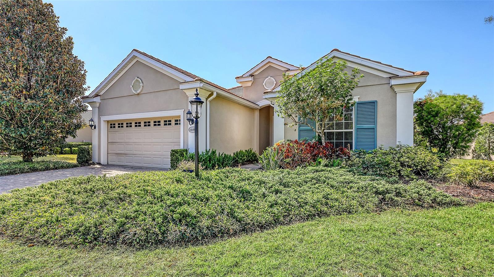 Discover the perfect blend of elegance and comfort in this impeccably maintained pool home, nestled in the gated community of Country Club East. Boasting breathtaking long lake views and a private outdoor retreat, this stunning residence offers an unparalleled lifestyle.
Designed with a spacious split floor plan, the home features a private guest wing with two generously sized bedrooms and a large guest bath—ideal for hosting family and friends. A sunlit den/office with engineered wood floors and double entry doors provides the perfect space to work or relax, while the open-concept layout seamlessly connects the formal dining room, great room, and a beautifully appointed kitchen with white cabinetry, granite countertops, and stainless steel appliances.
The primary suite is a true sanctuary, showcasing updated luxury vinyl flooring, two walk-in closets, and a spa-like en-suite with dual sinks and a walk-in shower. Designer touches include crown molding and wood framed windows, neutral porcelain floors, automated shades on the sliders, and fresh interior paint in the living areas.
Situated on a stunning water lot, the private pool and spa area is surrounded by lush bamboo, creating a tranquil escape. With just one seasonal owner, the home feels like new, reflecting years of meticulous care. A spacious two-car garage and a separate laundry room with a utility sink add to the home’s convenience.
Country Club East offers an array of amenities, including gated security, scenic walking trails, three resort-style pools, a club room, and a state-of-the-art gym. Optional memberships to the renowned Lakewood Ranch Golf & Country Club provides access to four championship golf courses, tennis, pickleball, and world-class fitness facilities.
Ideally located in the heart of Lakewood Ranch—consistently ranked the #1 master-planned community in the nation—you’ll enjoy easy access to the area’s finest beaches, as well as premier shopping and dining at Waterside and UTC. With close proximity to both downtown Sarasota and St. Pete, this home offers the ultimate Florida lifestyle.
Don't miss your chance to own this exceptional Lakewood Ranch retreat!