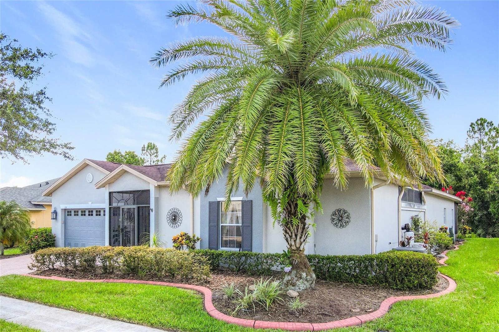 AMAZING, UPGRADED BOLERO model on a CONSERVATION lot in the Flora Vista subdivision of Solivita. ROOF new 2016. BOTH HVAC systems new 2019. Lanai extended, partially covered and screened 2015. Front COURTYARD screened 2011. CERAMIC TILE THROUGHOUT entire home. Kitchen features CAMBRIA QUARTZ Counters to include Island, 42" upper cabinets with CROWN MOLDING & GLASS doors, several lower cabinets have PULL OUT DRAWERS, newer appliances and RECESSED lights plus a SOLAR TUBE. REMODELED Primary Suite bathroom features upgraded cabinets, GRANITE counters, POCKET DOOR between the bedroom & bathroom, DUAL sinks, extra large WALK-IN shower with SEAMLESS GLASS and two walk in closets. 2nd bathroom has GRANITE counters, a tub with shower and closet with a POCKET DOOR. CASITA has FRENCH DOORS with built-in blinds new in 2021, QUARTZITE counter in the DINETTE area, GRANITE counter in the bathroom plus a tub with a shower and a full closet. Garage floor is painted with EPOXY. Exterior flower beds have LANDSCAPE CURBING 360 degrees around the house. Community Development District (CDD) DEBT is paid-off. **See the FULL LENGTH VIDEO on Tour Link 1.** ***Solivita is an active adult 55+ community located in Kissimmee, Florida. It is approximately 50 minutes from Disney World & the Orlando International Airport. Solivita has a total of 5,470 homes. Approximately 10,000 - 11,000 people live in Solivita during the winter while approximately 7,500 live in Solivita during the summer. Enjoy your active years in this piece of paradise. Solivita's amenities include: - a manicured SOFTBALL diamond & field - 36 holes of CHAMPIONSHIP GOLF that can be played by joining the Stonegate Golf Club or paying as you go - 2 STATE of the Art AMENITY centers with updated exercise equipment, yoga studio & meeting rooms - 3 restaurants - 14 HEATED POOLS - 17 PICKLEBALL courts - 9 TENNIS courts - 4 BOCCE BALL courts - 4 SHUFFLEBOARD courts - 3 HORSESHOE pits - a BILLIARDS room - miles of bike paths - 2 DOG PARKS (Small & Large Dogs) - Corn Hole - Tot Lot PLAYGROUND - COMMUNITY GARDEN - over 250 resident clubs. The HOA: - maintains the LANDSCAPING & IRRIGATION systems in the common areas as well as at individual homesites - maintains the roads throughout the community - PROVIDES SECURITY with gate guards and mobile patrols including the Polk County Sheriff - allows AUTOMATED GATE ACCESS for residents via license plate readers - provides residents with Fiber Optic Internet & TV service.***Poinciana Lakes Plaza is a MAJOR NEW SHOPPING CENTER that opened directly across from the Solivita Main Gate in Summer of 2024. It features Sprouts Grocery, TJ MAXX, Ross, Burlington, Rack Room Shoes, 5 Below, Ulta, Outback, First Watch, 5 Guys, Urgent Care, Dentist, TD Bank, Petco & Hair Cuttery PLUS MORE TO COME.***