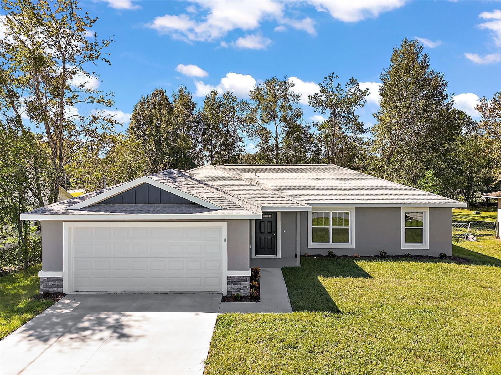 On a highly desirable lot, this home features 3 bedrooms with 2 full baths. Live large with vaulted ceilings as you enter the open concept layout. Eat-In kitchen, including a conveniently placed pantry, is ideal for entertaining with oversized island overlooking the main living area. Primary suite features tray ceilings, walk in closet, dual vanities and tile recessed shower. Home features include granite countertops and soft-close wooden cabinetry. Plank-style flooring is installed throughout the entire home and NO CARPET! Linen closet in guest hallway and inside utility closet in laundry room make for additional storage ideal. Walk out on your covered back patio - ceiling fan included - overlooking your backyard. Builder warranty is included - this home is a MUST see.