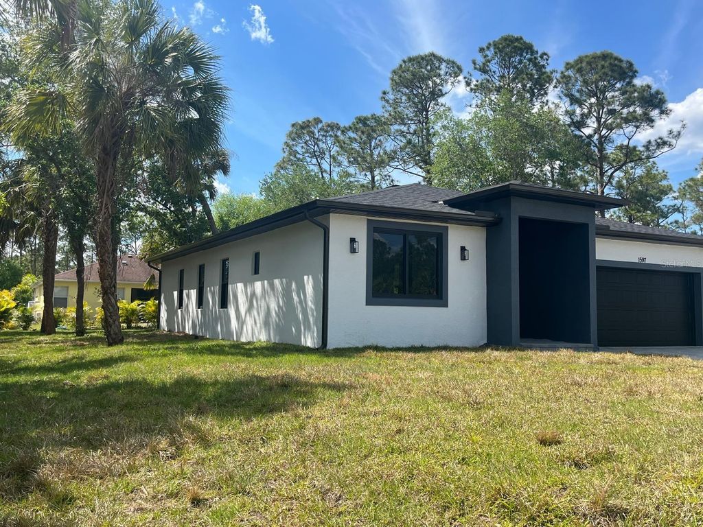 Photo of 1597 Kerman Street, North Port, FL 34288 (MLS # O6402212)