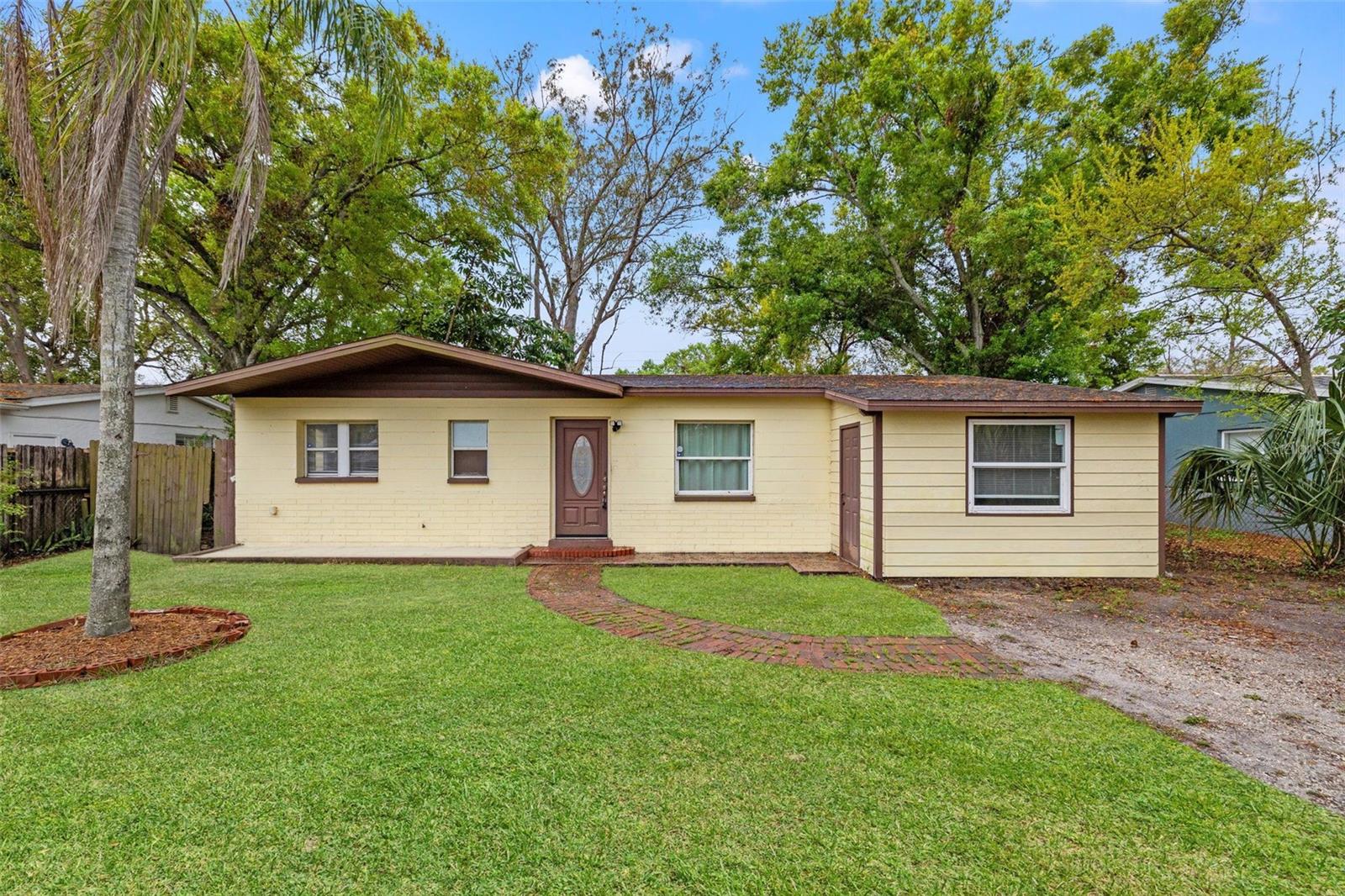 Cash cow!! Incredible opportunity for those looking to HOUSE HACK or for the investor looking for an 8%+ cap rate investment property. Perfect for the 1031 exchange buyer. The main home is a 4 bedroom, 2 bathroom that would rent for around $2,500/month and the back studio mother in law suite with a kitchenette would rent for $1,000/month achieving the golden “1% rule” for every investor! Or live in tone unit and have the other pay the bills! Located in unincorporated Pinellas, which means you can legally do short term rentals like AirBnB or VRBO. Non-flood zone and block construction helps keep the insurance costs down and cash in your pocket for now and in the future. Some of the updates include vinyl flooring, fresh paint, some updated windows, newer stainless steel appliances, and so much more. Don't delay! Call today, and be the envy of family, friends, and neighbors.