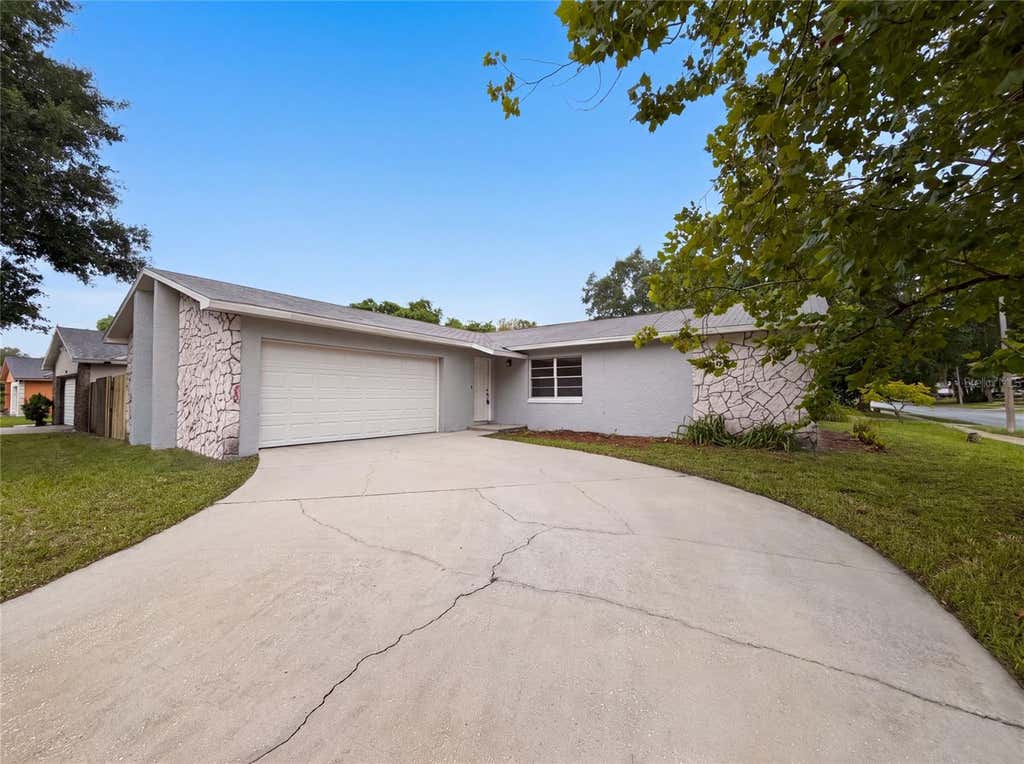 Photo of 8310 Rolling Log Drive, Orlando, FL 32817 (MLS # O6432867)