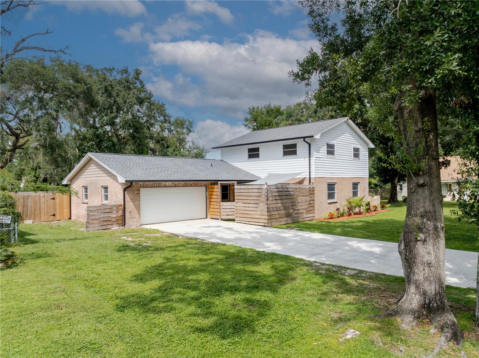 Welcome to 2806 Springdell Circle, a stunning 5 bedroom, 4 bathroom residence offering 2,774 square feet of refined living space in the heart of Valrico. This home has been thoughtfully updated, roof and gutters completed in 2023, a new AC system serving the primary bedroom, fresh interior paint, new carpet upstairs, and a beautifully renovated bathroom completed in 2025. The septic system was replaced in 2020, the well pump was updated in December 2024, the well pressure tank in 2023, and the water heater in 2025, giving you peace of mind with every major system recently addressed!! The interior features a large kitchen with an abundance of cabinetry, an island at the center for gathering and meal preparation, and a layout that flows seamlessly into the formal dining and living areas. The primary suite is conveniently located on the first floor, while a secondary primary suite is found upstairs. The thoughtful split floor plan is complemented by a massive laundry room designed for both practicality and comfort. Set on a fully fenced lot, the property offers a custom patio with gate and brand new fans, creating the perfect space for outdoor entertaining. This home sits high and dry in Flood Zone X, does not require flood insurance, and has never flooded during the sellers ownership. Without the restrictions of an HOA or CDD, you can enjoy the freedom to live as you choose, all while being perfectly located near shops, restaurants, and just a short drive to both Tampa and Lakeland. 2806 Springdell Circle is more than just a house it is a rare opportunity to own a move-in ready Valrico home with space for everyone, modern upgrades throughout, and the kind of setting that makes every day feel special. Homes like this do not come along often, and this one is ready to welcome its next chapter.