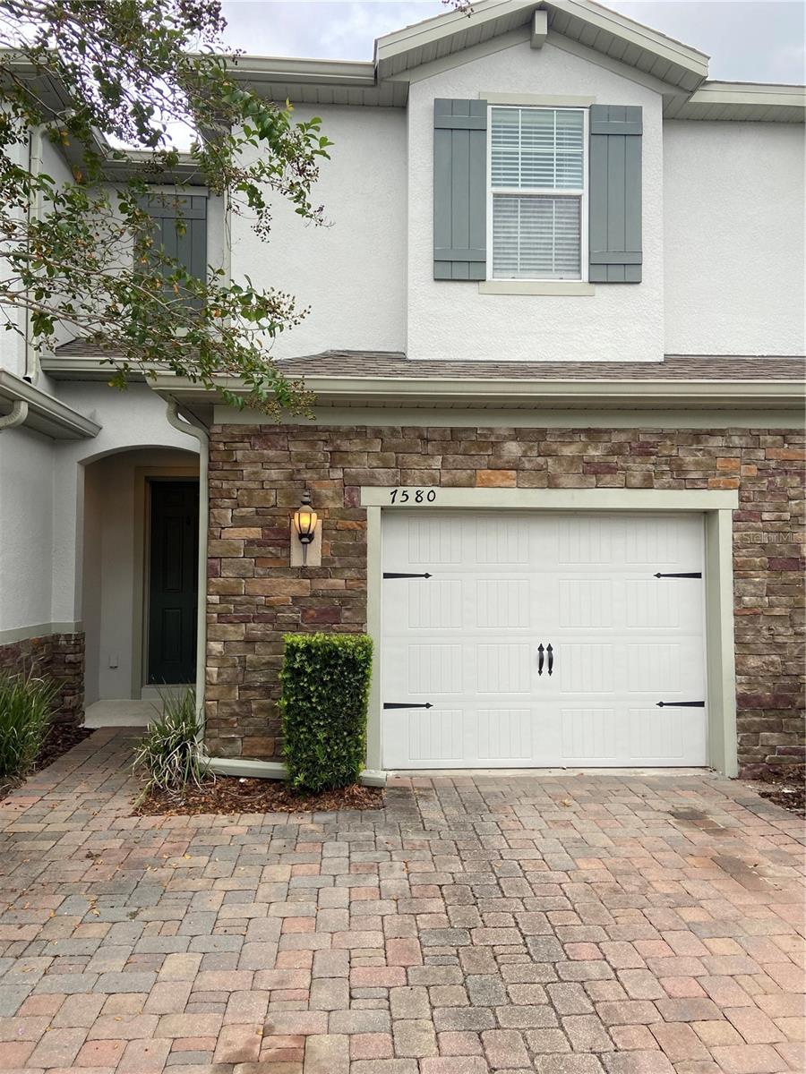 Welcome to 7580 Aloma Pines Ct, a 3 bedroom, 2.5 bath, 1,872sqft, two-story town home in the gated community of Aloma Trails will be ready for you to call home! The town home features an open floor plan with 18" tiled floors throughout the first floor living area, kitchen and dining room, all bathrooms and the inside utility room. The kitchen features upgraded 42" cabinetry, tiled back splash, granite counter tops, plenty of cabinet storage, counter top and preparation space, large kitchen island, large walk-in pantry and upgraded appliances including the refrigerator, stove, over-the-range microwave, dishwasher and disposal. With views of the backyard and pond through the sliding glass doors, the kitchen, living room and dining room enjoy plenty of natural light and an open and expansive feel. On the second floor, you will find the master and guest bedrooms, guest bath, inside utility room and plenty of storage in the multiple linen closets. The master bedroom suite is separated from the guest rooms giving it a very private feel and with en-suite bath featuring dual vanity sinks, glass enclosed shower, large walk-in closet and plush carpeting it is everything one could ask for in a master bedroom! The guest bedrooms are well-sized each with reach-in closets and easy access to the guest bathroom. An oversized one-car garage, open patio overlooking the backyard and high efficiency AC and hot water heater round out this town home. With easy access to Park Avenue, UCF, Rollins College, shopping, dining and entertainment this is a wonderful place to call home!
Please note, this property is in a gated community. Once your showing is scheduled, please contact our office during business hours to obtain gate access information.
