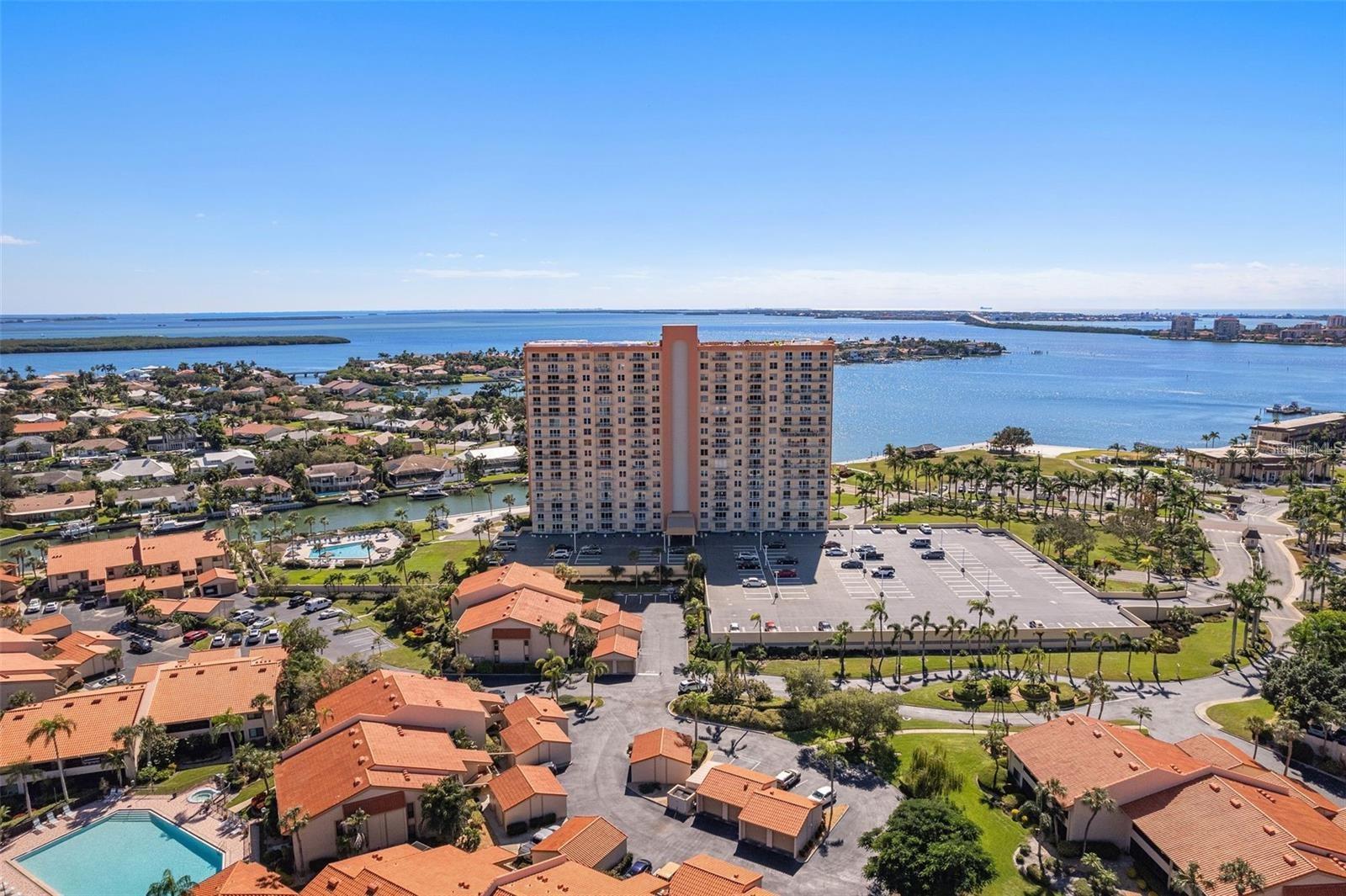 Experience breathtaking waterfront views from this stunning corner 7th-floor 2 bedroom/ 2 bath suite at Point Brittany Condos in St. Petersburg! Overlooking Boca Ciega Bay, Downtown St Pete's skyline, Gulfport and North towards the Gulf of Mexico, this unit offers a truly spectacular visual experience, making you feel as though you're floating above Bayway Isles. Step inside to a beautiful bright space featuring a large kitchen with brand new refrigerator, quartz countertops, an open-concept living area and an oversized balcony spanning the entire length of the unit designed to maximize the stunning panoramic views from living room and both bedrooms. Carpeting is all new. There are three walk in closets. This is a non-smoking rental. No pets allowed. Resort-Style Amenities: Secure parking with a dedicated garage space and ample guest parking. Enjoy four sparkling swimming pools, Community recreation center with billiards, darts, a card room, lounge, dance studio, and craft room, Fitness facilities, including Pilates and more... Scenic waterfront walkways throughout the meticulously maintained twenty-five-acre complex. Enjoy On-site conveniences such as a beauty salon, medical offices, and a deli/market. Located just minutes from Isla Del Sol Golf Course and the world-renowned Don Cesar Beach Resort & Spa, this community offers a perfect blend of relaxation and convenience. Minutes to I-275 Community provides a very active 55+ lifestyle. Available August 2025 for an annual lease! Rent: $2600.00/month -Fully furnished and turnkey, includes water and cable package, free laundry (2 on each floor), private storage. Security Deposit: $2600.00 First, Last Month and security Required (Move-In: $7,800 +cleaning fee $100 + application) HOA Approval Required. Proof of rental insurance prior to occupancy. Don’t miss this incredible opportunity to live the waterfront lifestyle! Contact for more details and to secure this stunning unit today. Open to 7 month+ lease. Terms to be discussed.