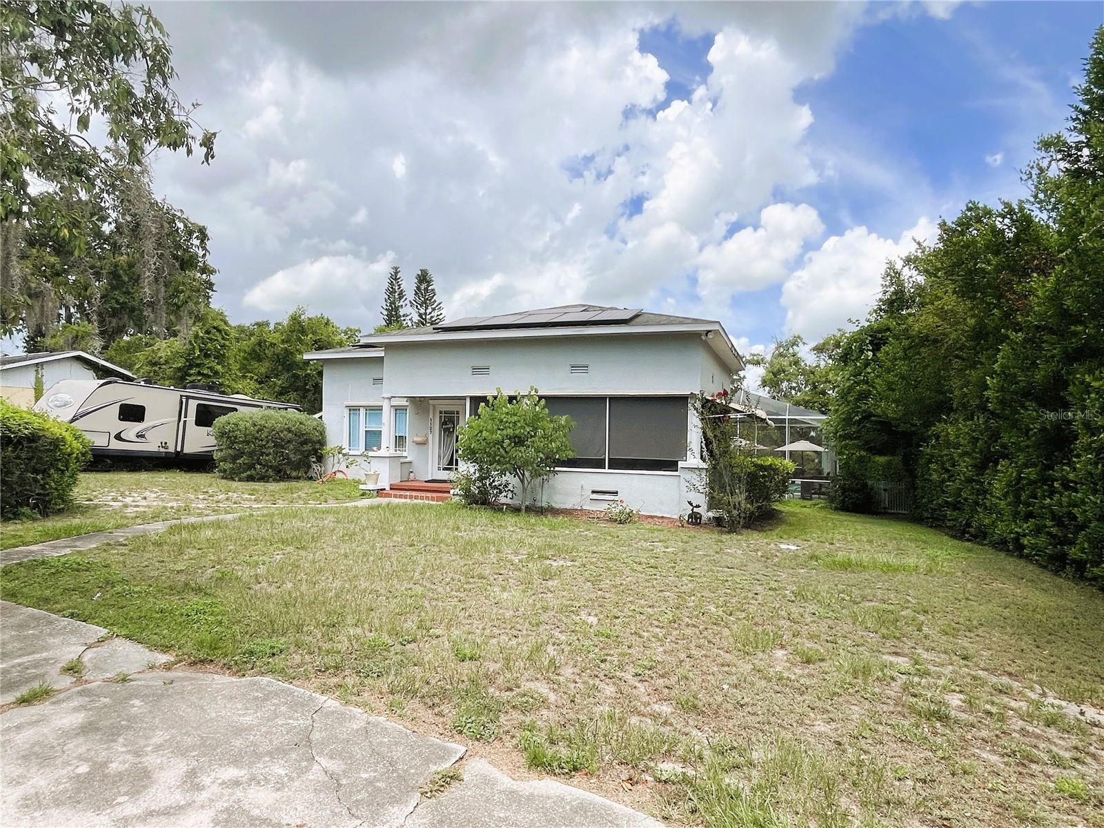 3/2 HISTORIC HOME WITH POOL IN LAKE WALES!!! 1920 Single family home on spacious lot with views of Lake Wailes. Covered wood deck to the in ground pool with screen enclosure. Large wraparound screened front porch. Detached garage with long drive way. Solar panels installed in 2020. Windows have awnings that double as hurricane shutters. Real wood and ceramic tile flooring through out. Ceiling fans throughout. Split bedroom floor plan. Kitchen features a view of Lake Wailes from the sink window, stainless steel appliances, garbage disposal, solid surface counter tops and real wood cabinets. Living room features gas fire place and French doors that open to the wraparound porch. Make your appoint to see today! More photos to come.