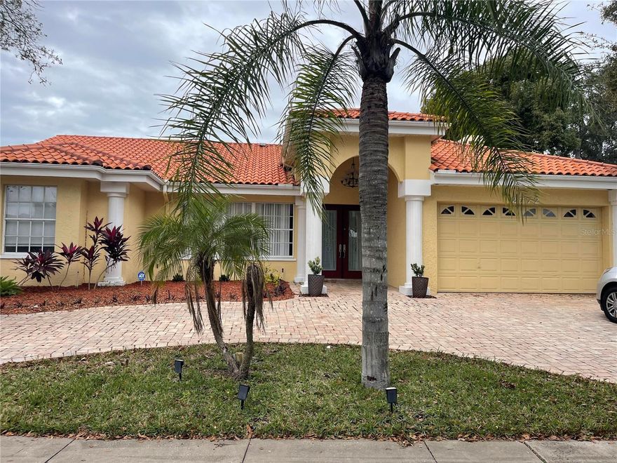 This pool home is a 3-bedroom, 2-bath residence with a 2-car garage, situated off Curlew Road on the west side of US Hwy. 19. The interior features high volume ceilings, crown molding, and real hardwood floors throughout. The living room includes a fireplace, and the open, spacious kitchen is finished with granite countertops.

The master suite offers a garden tub, dual sinks, and a separate walk-in shower. Outside, the property includes a paved circular driveway and a fenced-in backyard. Additionally, the home is located just minutes from Honeymoon Island Beaches.