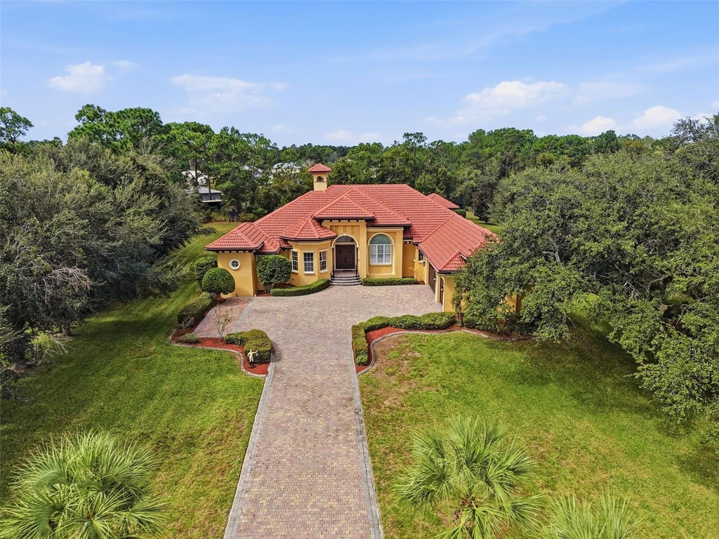 Photo of 9313 Hernando Ridge Road, Weeki Wachee, FL 34613 (MLS # W7890352)