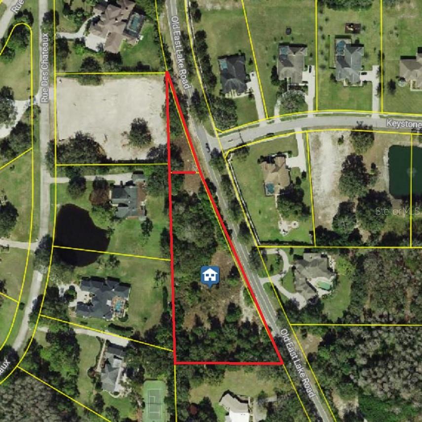 Build your dream house on over 2 Acres of Residential land in an upscale area with luxury homes in Tarpon Springs in Florida. Not in a Flood Zone. 1 large lot and 1 small lot combined 2.16 Acres. Water well on the property. Electricity connected to the well pump. Wood poles with wire fence are along the property. See Pictures.