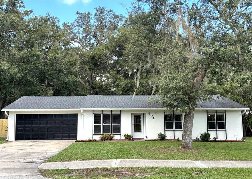 Welcome to this charming DeLand home offering comfort, and a fantastic location! Situated on a large fenced lot with beautiful mature trees for shade, this property is perfect for outdoor living, gardening, or play. Major upgrades include new paint inside and out (2025), roof (2021) and A/C system (2019), providing peace of mind for years to come. Inside, you’ll find a well-designed layout that’s ready to make your own.  Enjoy the large living room perfect for movie nights with the family or for entertaining!  The kitchen has plenty of cabinets, stainless steel appliances that include a brand new Whirlpool refrigerator and a brand new stainless steel sink!  The dining room has french doors that lead out to your private oasis!  Think of all the beautiful evenings you can enjoy sitting around a fire, or watching the kids play in the comfort of your private backyard.  The Master Bedroom is generous in size and offers your own ensuite.  Bedrooms 2 and 3 are spacious as well and share the second bathroom.  Located just minutes from Historic Downtown DeLand, you’ll enjoy award-winning restaurants, boutique shopping, local breweries, and cultural events year-round. Outdoor enthusiasts will love being close to Blue Spring State Park, De Leon Springs, and Lake Beresford Park, offering boating, hiking, manatee viewing, and some of Florida’s most beautiful natural springs. Stetson University is minutes away, as well as Blue Lake Elementary.  Easy access to I-4 makes commuting to Daytona Beach or Orlando a breeze.  Don’t miss this opportunity to own a move-in ready home in one of Central Florida’s most desirable towns!