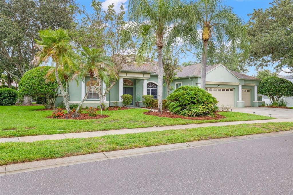 Photo of 5501 Stag Thicket Lane, Palm Harbor, FL 34685 (MLS # TB8535695)