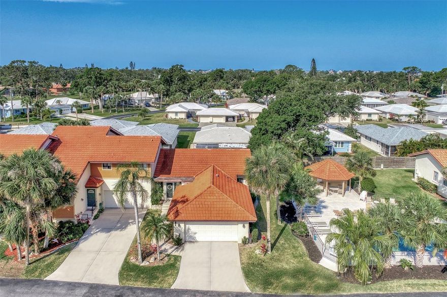 REDUCED! OPEN, EASY TO ACCESS  WEST of Tamiami trail, turnkey condo/villa, 2/2 with den, or 3/2 depending.Updated with nice turnkey furnishings included.,  Terra Cotta, Saltillo tile is consistent flooring throughout. The kitchen features granite countertops and a b-fast bar with Fridge & Convection Stove both less than 2 years old. Bathrooms are tastefully decorated with granite, medicine cabinets, bidets & shelving. See the two-car garage and is steps away from the community pool.  It is an oversized garage, equipped with a washer/dryer, extra refrigerator and plenty of shelving for all your families toys.  There is a quiet screened-in porch as well as a back paver patio lanai for the griller in the family. Ride your bike to Nokomis Beach. Visit nearby, Oscar Scherer Park. Venice, and Siesta Key, they are . The arts, culture $ Sarasota events are less than 40 minutes north.  Great investment for a boater/beach family as there's a boat basin offsite where one can lease upon availability only if you live in Sorrento. (easily use a  golfcart to go to the beach, boat, and store makes it convenient for the handicapped also) Perfect for the families from around the world who want the Coveted Pine View School for their children. Retirees, remote workers, investors, or first-time buyers. Say your looking for that high end luxury waterfront home and are ready to move but can't find it.  Why rent for the season?  This is a great investment, wheither it's cash or a VA Loans (sellers feels this condo may not be on the  VA list but HOA, and Condo's attributes SHOULD comply. Newer AC W/transferrable warrenty, no assessments...)   HOA fee, unlike in many, include paintings roof. Call to see virtually or in person and get excited to make your move today.