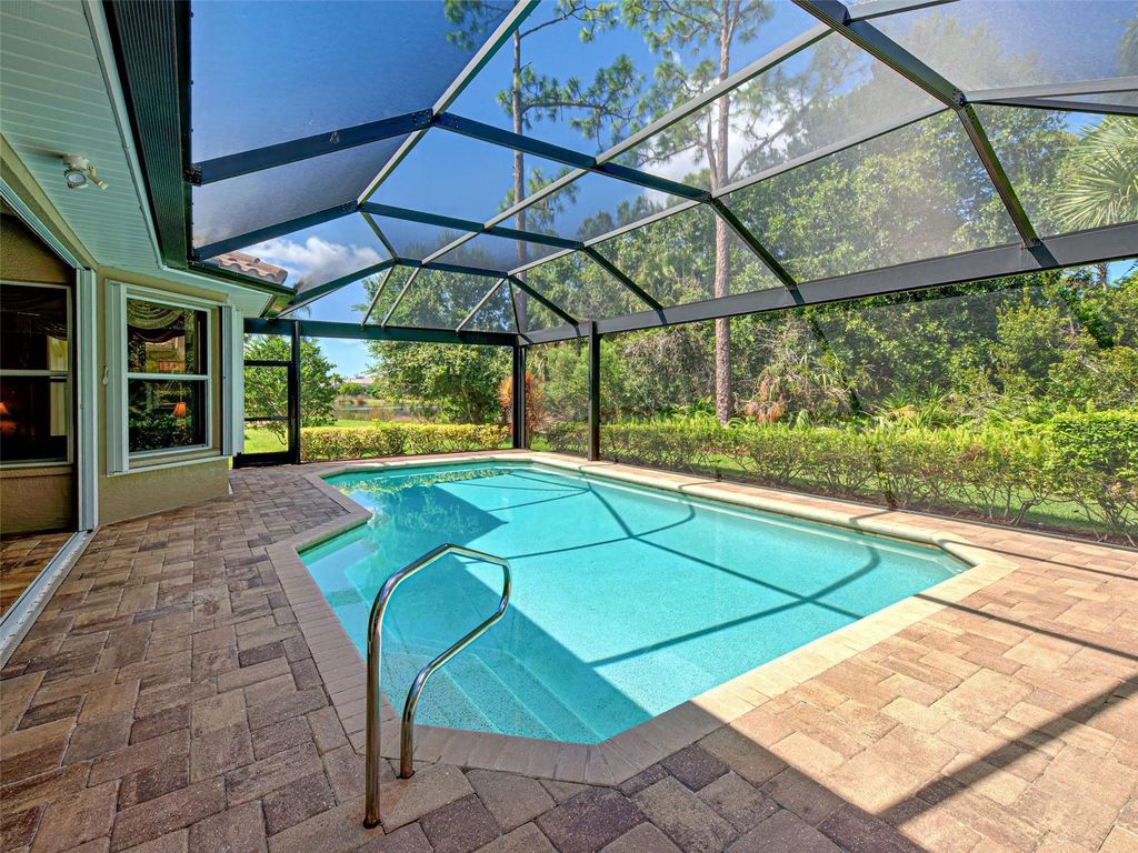 Photo of 635 Sawgrass Bridge Road, Venice, FL 34292 (MLS # N6140237)