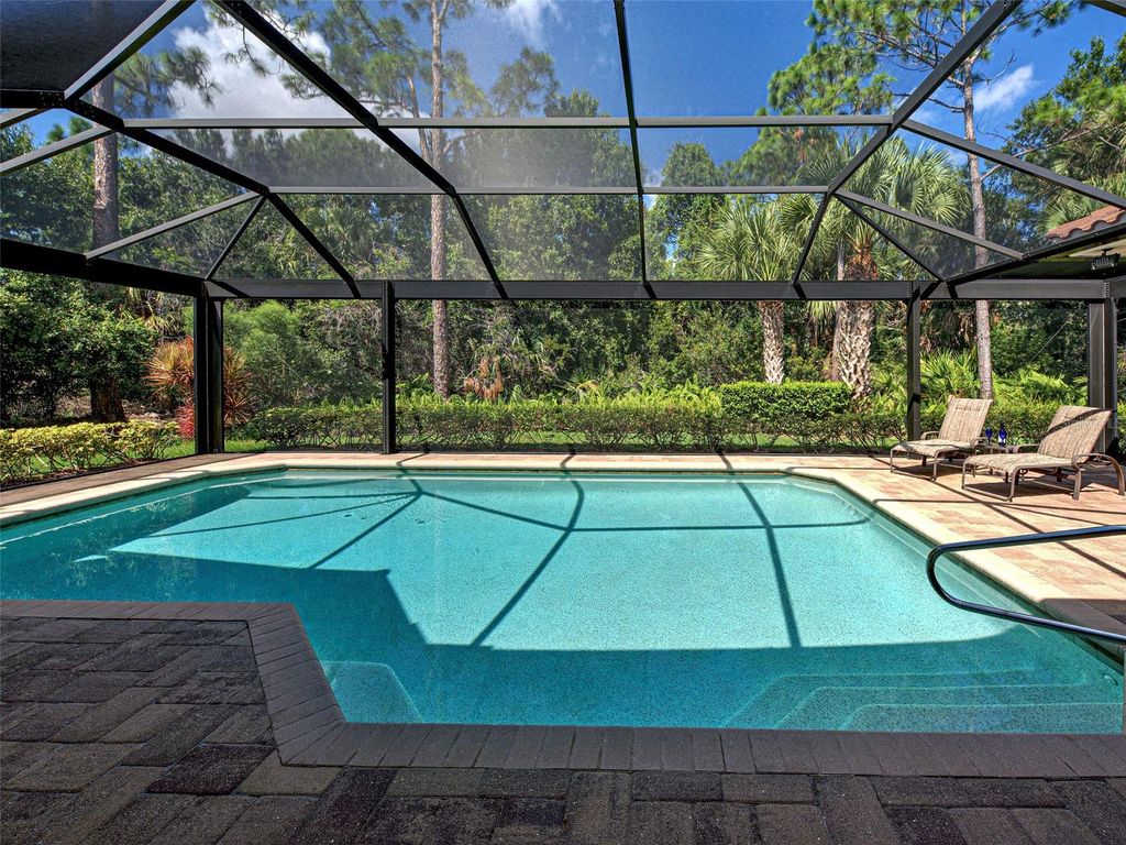 Photo of 635 Sawgrass Bridge Road, Venice, FL 34292 (MLS # N6140237)