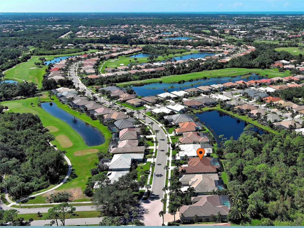 Photo of 635 Sawgrass Bridge Road, Venice, FL 34292 (MLS # N6140237)