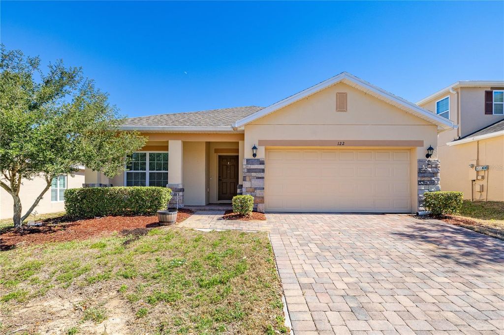 Photo of 122 Andalusia Loop, Davenport, FL 33837 (MLS # S5143947)