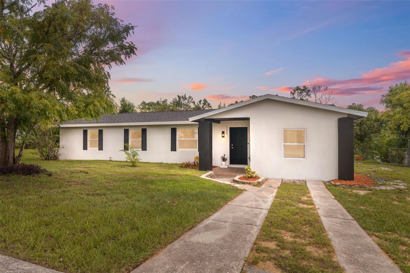 One or more photo(s) has been virtually staged. One or more photos has been virtually staged. Newly remodeled with a brand-new roof replaced in July 2025, this inviting 2-bedroom, 2-bath home offers modern updates and timeless comfort from the moment you arrive. The front covered porch welcomes you inside where fresh paint and new light wood-look vinyl plank flooring flow seamlessly through the living room, dining area, and kitchen. The kitchen is a bright focal point with white cabinetry, stone counters, tile backsplash, and stainless steel appliances, and it opens directly to the rear covered porch, perfect for enjoying your morning coffee or winding down in the evening. Both bathrooms have been thoughtfully renovated, with the primary ensuite showcasing dual vanities, large marble-look tile, a step-in shower with rain shower head and additional sprayer, and crisp, clean finishes. The guest bath carries the same elegant design with a single vanity. A converted garage adds flexibility for use as a third bedroom, office, or fitness space. Outside, the fenced backyard with mature trees provides a sense of privacy, while sidewalks out front make daily strolls easy and enjoyable. Conveniently located, Weeki Wachee Springs State Park, known for its crystal-clear springs and wildlife, is just 6 miles away, Pine Island Beach with its breathtaking sunsets is 11 miles away, and the Suncoast Shopping Center is only 5 miles away for dining and shopping needs. Best of all, the Suncoast Expressway is 10 miles from the property, offering a direct and efficient route into Tampa and surrounding areas, making commuting for work or play stress-free. This home blends modern style, function, and location to create a place that feels move-in ready and truly special.