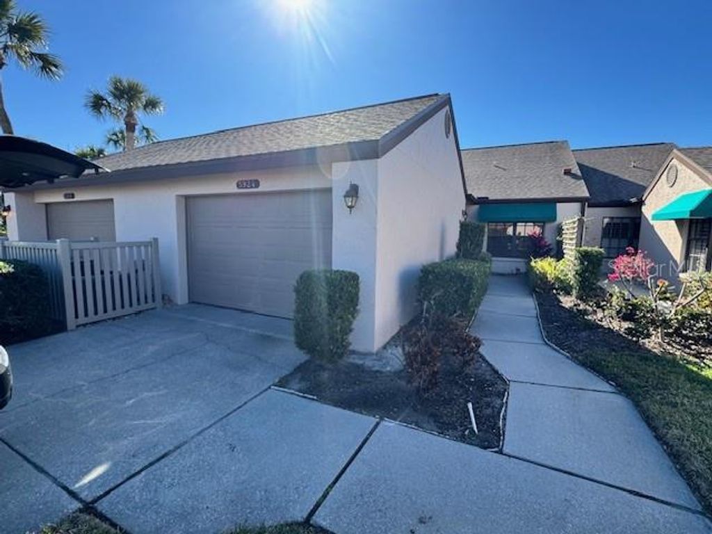 Photo of 5924 Clubside Drive, Sarasota, FL 34243 (MLS # TB8490872)