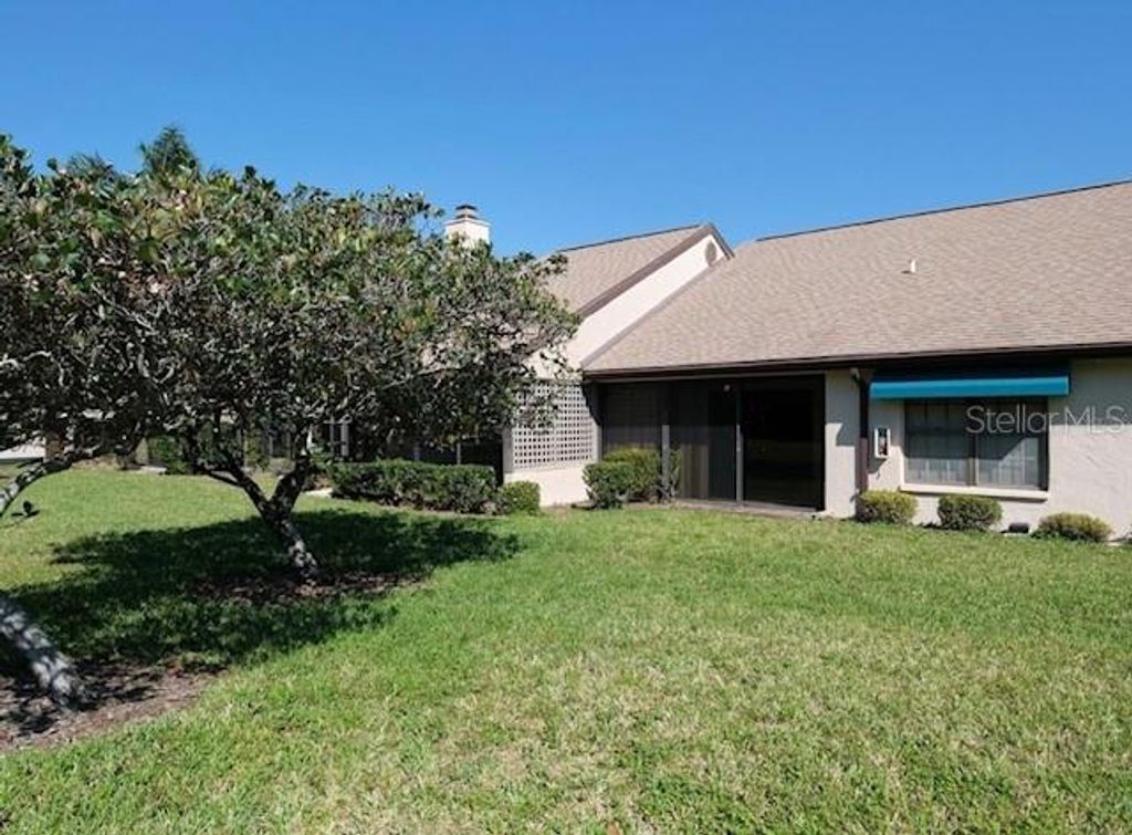 Photo of 5924 Clubside Drive, Sarasota, FL 34243 (MLS # TB8490872)