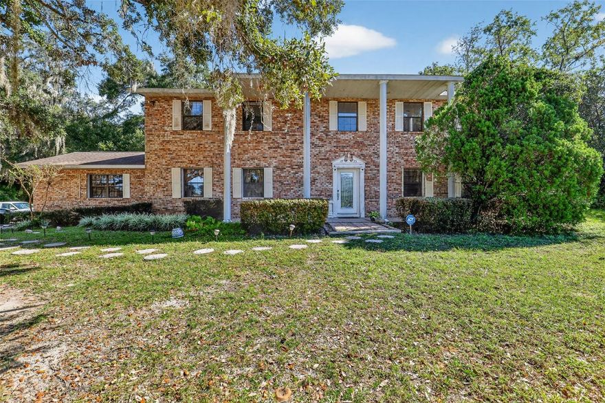 Introducing, to the market for the first time, the majestic 1925 NW 60th Ave estate in the
coveted 34482 zip code of Ocala. Fl.! This custom, 2-story, brick home rests on a sprawling 2.97
acres and faces the west giving you perfect views of the sunset! With a family and formal
living room, dining room, office, full kitchen, 5 bedrooms and 3 bathrooms, indoor laundry, and a
2 car garage, this property offers more than enough space and opportunity! Rather it's the
location, just 7-10 minutes from the World Equestrian Center, 10 minutes from I-75, and nestled
between both highway 27 and state road 40; or rather it's the endless potential that this gem of
a property affords you, there's much value to be gained!