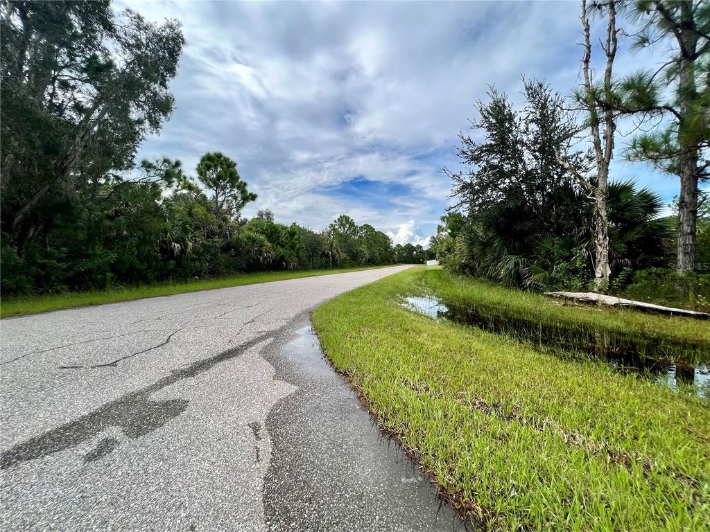 Photo of 12068 Alumna Avenue, Port Charlotte, FL 33981 (MLS # C7491784)