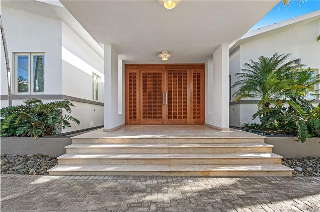 From the rich-sunsets to the vibrant locale, this majestic home has a touch of Underwood the architect and is everything you want and more! The front door opens to a cascade of light illuminating! The soft warmth of this luxury open-concept showcases 6-bedrooms and 7 1/2 bathrooms, in which 1 is up in the terrace with its own bathroom and central A/C that flows perfectly from one to the next. An entertainer’s dream, from the spacious dining room that opens to the contemporary eat-in kitchen. Nestled in the heart of Dorado, just minutes away to trendy shops, restaurants, delectable bakeries, great schools, parks and the cherry on top Krispy Kreme. Minutes away from the beach and highway.