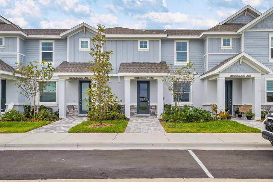 Experience the perfect blend of luxury and lifestyle in this one-of-a-kind completely custom townhome located at 7304 Portlight Lane, Sarasota, FL 34240. Located in the heart of Waterside, Lakewood Ranch’s most walkable and amenity-rich neighborhood, This unique residence offers 3 bedrooms, 2.5 bathrooms, a two-car garage, screened in lanai and 1,776 square feet of comfortable living space. 
This newly constructed residence offers sophisticated design, serene water views, and exceptional craftsmanship throughout. Step inside to discover premier finishes and a curated selection of high-end upgrades. The designer kitchen showcases Taj Mahal quartzite countertops, elegant white oak cabinetry, and premier appliances throughout, creating a stunning and functional culinary space. Every element has been elevated - from the tile wood floors and underlit staircase to the custom wallpaper selections, adding texture and refinement to each space.
Enjoy the unparalleled walkability of Waterside, where shops, dining, and recreation are just steps away. This home represents a rare opportunity to own a truly unique property in one of Sarasota’s most desirable communities.