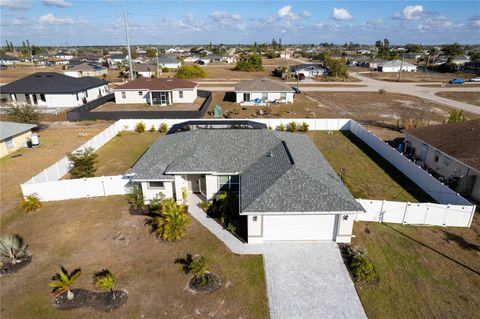 Photo of 2013 NW Juanita Place, Cape Coral, FL 33993 (MLS # A4683085)