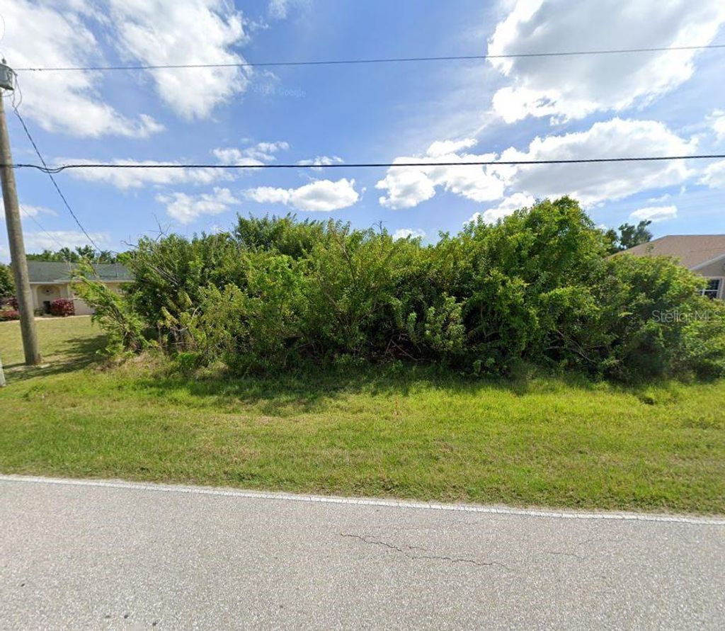 Photo of 5404 David Boulevard, Port Charlotte, FL 33981 (MLS # D6139376)