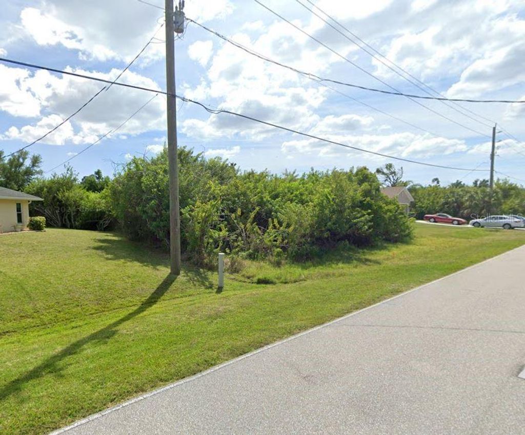 Photo of 5404 David Boulevard, Port Charlotte, FL 33981 (MLS # D6139376)