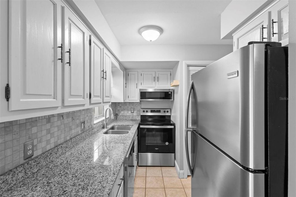 Photo of 5126 Saint Charles Lane #43, Orlando, FL 32822 (MLS # O6364124)