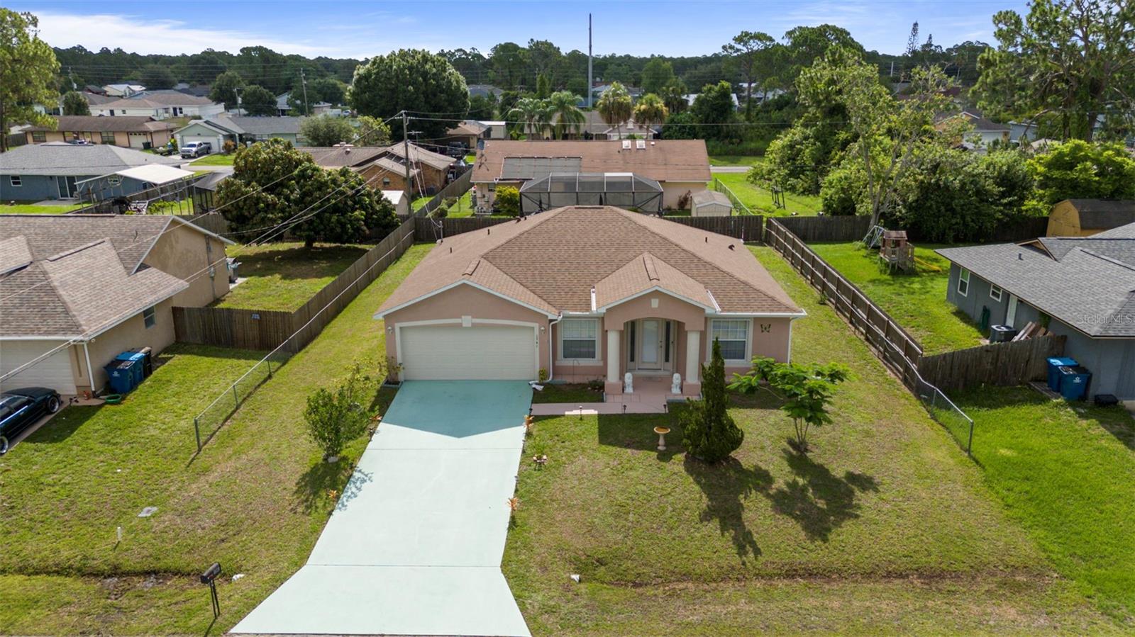 Some homes just feel right the moment you walk in and this one might even high five you at the door.
Tucked away on a quiet street, this 3-bed, 2-bath brings comfort and peace of mind: the roof was replaced in 2022, AC and shutters upgraded in 2020, and the water heater joined the crew in 2023.
Inside, vaulted ceilings and an open layout make the space feel light, easy, and just the right amount of cozy. The Primary bathroom has a soaking tub, double sinks AND walk in shower!
The screened porch is ideal for lazy weekends or mosquito-free deep thoughts.
You wanted space from your parents; well, this one has tons of room for activities. Tell them you found the ONE and schedule your showing today!