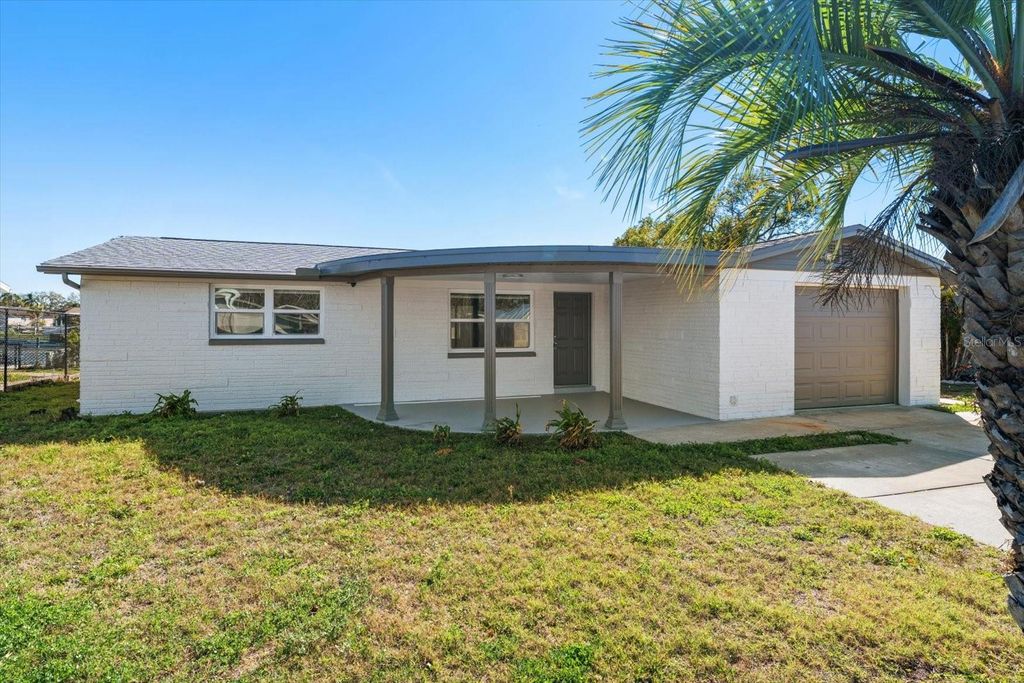 Photo of 4120 Sunray Drive, Holiday, FL 34691 (MLS # TB8476233)