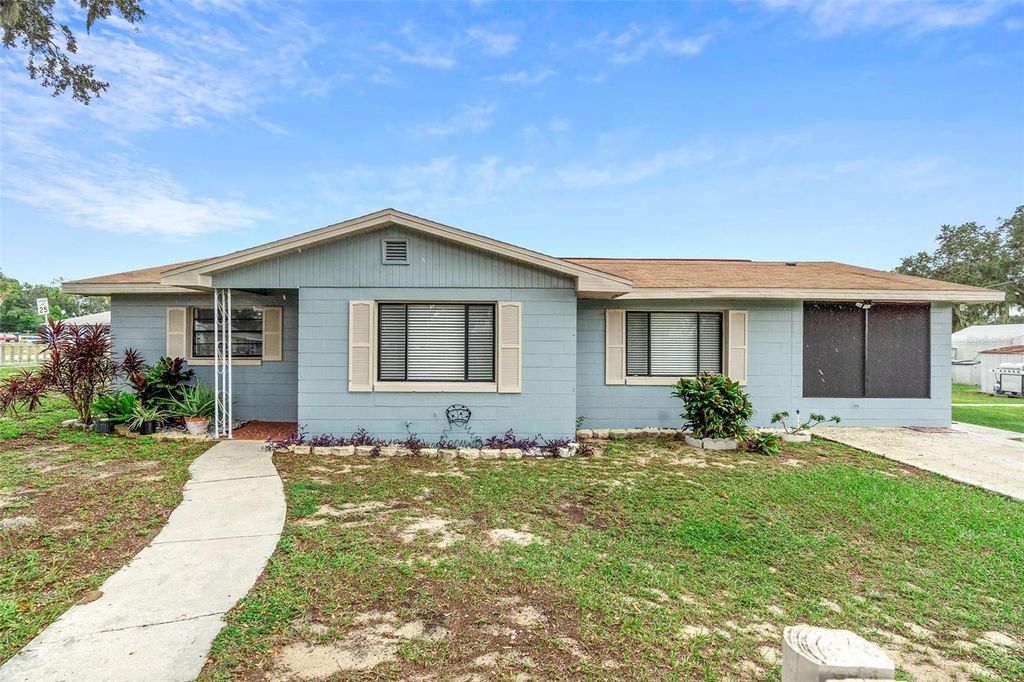 Photo of 1 E Palm Street, Davenport, FL 33837 (MLS # O6353668)
