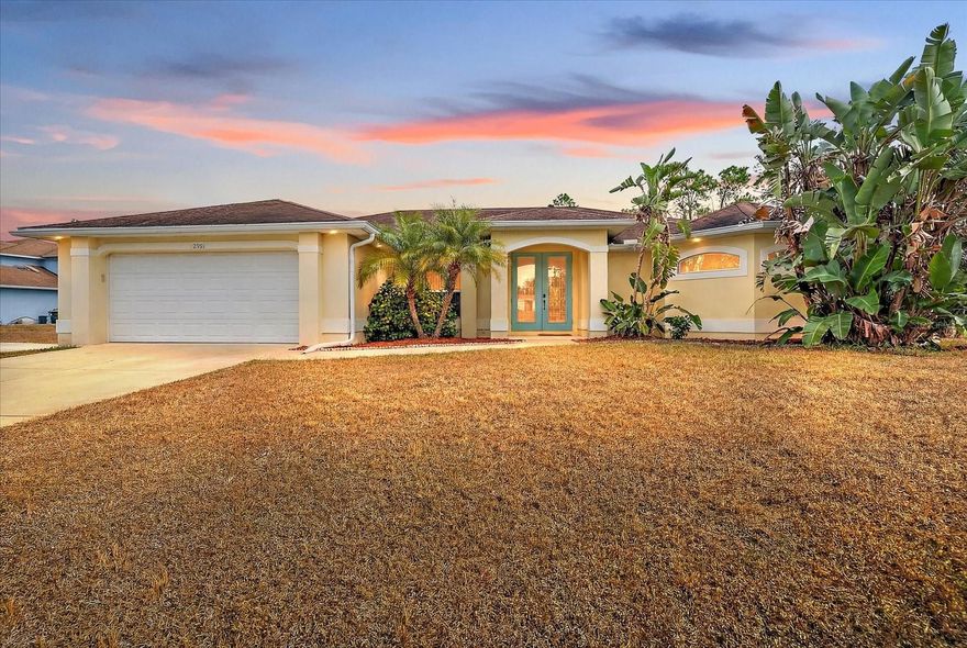 Welcome to this beautifully maintained 3-bedroom, 2-bath home with a dedicated office, offering spacious ceilings, functional design, and rare bonus features. Located on a desirable corner lot, this property blends comfort, flexibility, and business-friendly convenience.

The primary suite is a true retreat, featuring elegant tray ceilings, dual walk-in closets, dual vanities, walk-in shower, and separate centerpiece bathtub —a layout designed for both luxury and efficiency. The open living areas are filled with natural light and flow seamlessly to the screened lanai, perfect for relaxing or entertaining year-round.

The kitchen is equipped with clean, white appliances and ample workspace, making it both practical and inviting. A newer HVAC system (only 2 years old) adds peace of mind and energy efficiency.

A standout feature of this property is the 242-square-foot detached workshop, fully supplied with electricity and air conditioning—ideal for a an array of buyers. NO HOA, NO CDD FEES, NO DEED RESTRICTIONS