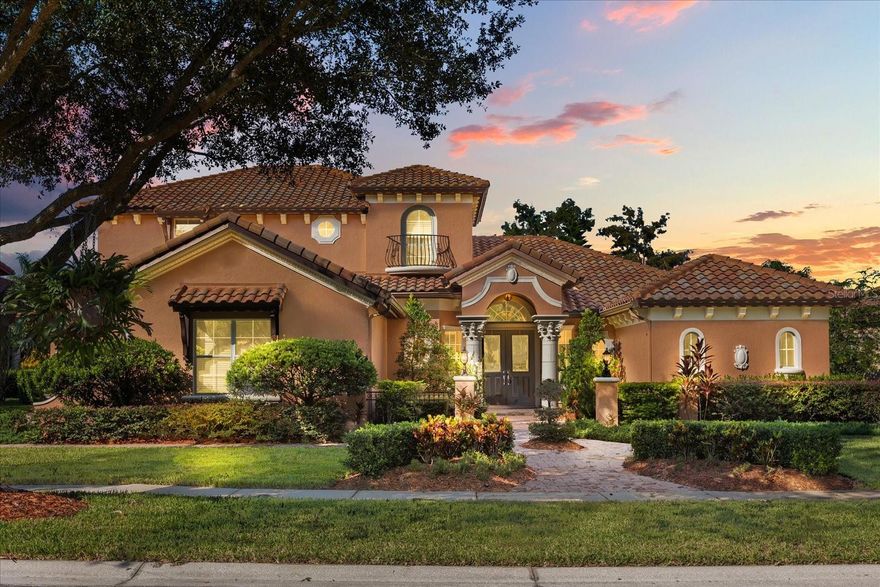 Imagine waking up each morning to sparkling water views—the pond and fountain glistening just beyond the window. That’s the lifestyle waiting for you in this Windermere luxury home inside the exclusive gated community of Tuscany Ridge.

Step inside and discover the perfect balance of timeless elegance and everyday comfort. Soaring ceilings and sun-filled living spaces set the tone, while the chef’s kitchen complete with premium appliances including a natural gas stove, custom cabinetry, and a large center island designed for entertaining.

The primary suite is a true retreat, offering Tuscan spa-inspired design, serene water and pool views, and two expansive walk-in closets. A thoughtful first-floor layout also includes a private office and guest suite, creating flexibility for work or multigenerational living. Upstairs, you’ll find three additional bedrooms, a versatile loft, and a screened balcony—ideal for movie nights, game days, or simply enjoying quiet moments of privacy.

Outdoors, the extended screened lanai and resort-style pool overlook tranquil water views, delivering front-row seats to stunning Florida sunsets. Lush landscaping and fruit trees complete the picture of natural beauty and serenity.

This 5-bedroom, 4.5-bath estate is more than a beautiful home—it’s about location. Tuscany Ridge offers a rare combination of privacy and convenience: top-rated schools, upscale shopping and dining, golf, and Orlando’s world-class attractions—including Disney and Universal—all just minutes away.

Here, every day feels like a getaway. Welcome home to Tuscany Ridge living at its finest.