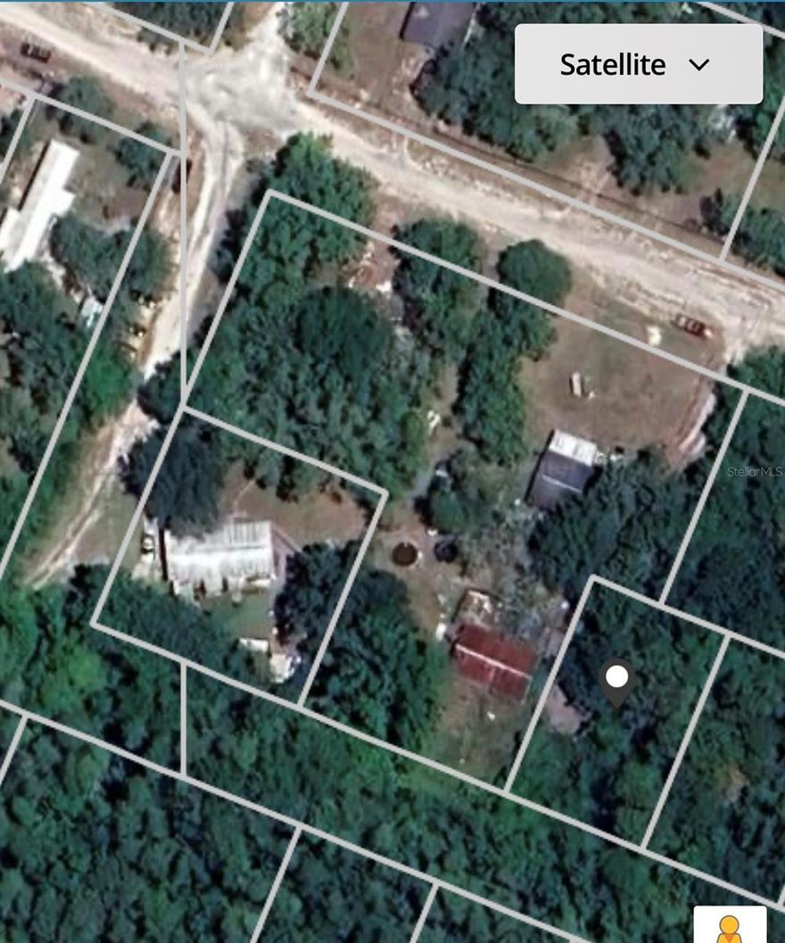 Vacant lane. 2 parcels in 1. Residential in surrounding areas. There are many vacant lots that are owned around this one. The road doesn't go to this lot. It stops at a couple lots away where the last home was built. No well or septic on property.