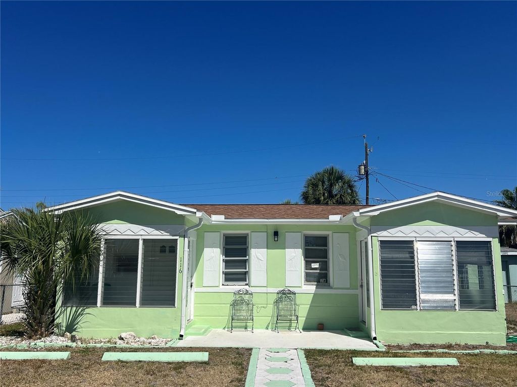 Photo of 116 145th Avenue E, Madeira Beach, FL 33708 (MLS # TB8502705)