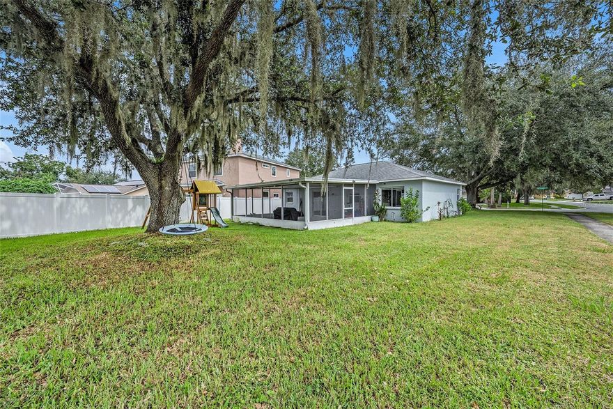 Unbeatable financing + unbeatable lifestyle! Why rent when you can own this updated 2-bedroom, 2-bath home on an oversized corner lot in Country Hills? Inside, enjoy vaulted ceilings, an airy split floor plan, vinyl plank flooring, and an updated kitchen with butcher block counters, subway tile backsplash, stainless steel appliances, and pantry. Both bedrooms feature walk-in closets and their own updated baths. Step outside to what truly sets this home apart: a 480 sq ft screened lanai, perfect for year-round Florida living—dining, entertaining, or simply relaxing while the kids play in the yard. With a one-car garage, low HOA ($25/month), and no CDD, this home combines charm, comfort, and affordability. Move-in ready and waiting for its next owner!