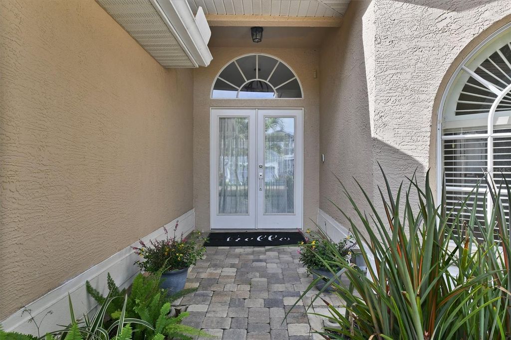 Photo of 1272 Jasmine Lake Drive, Tarpon Springs, FL 34689 (MLS # W7884287)